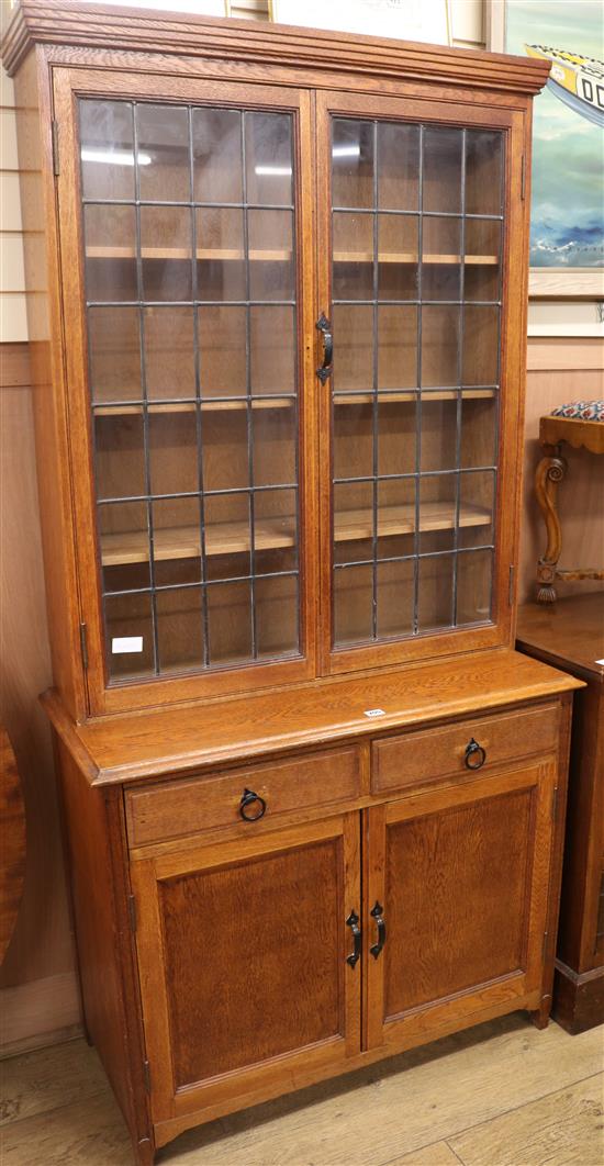 A leaded oak bookcase, H.190cm